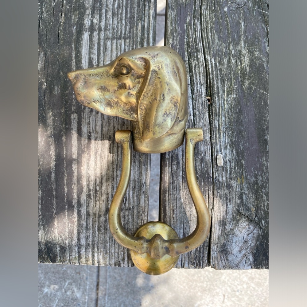 Vintage brass door knocker set. Looks like a Pointer.